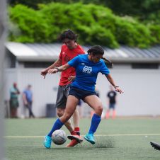 A tense moment in a soccer game.